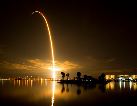 space x falcon 9 rocket night launch in titusville, florida