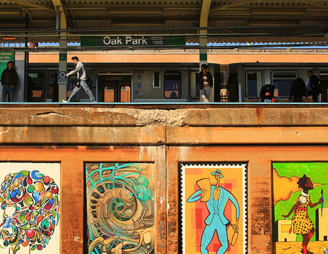 colorful murals at a train platform in oak park, illinois