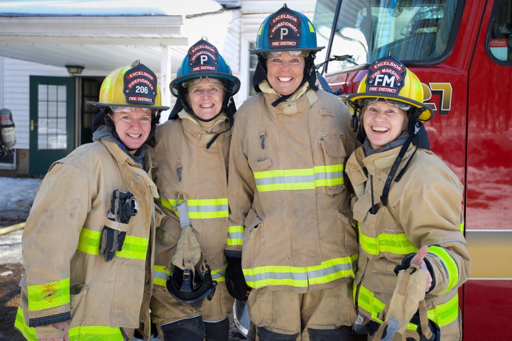 Firefighter Sandy Dostal, Excelsior Councilmember Lou Dierking, Tonka Bay City Administrator Kathy Laur, and Fire Marshal Kellie Murphy-Ringate