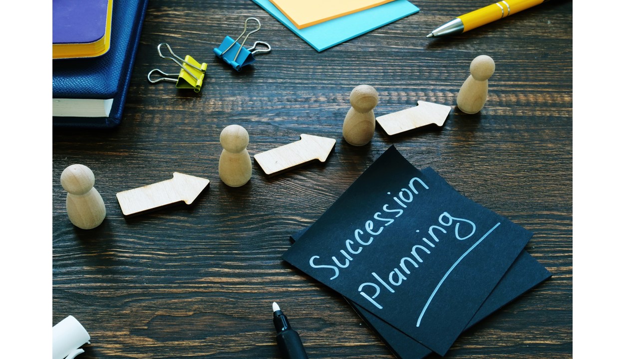 Image of a post-it that says Succession Planning