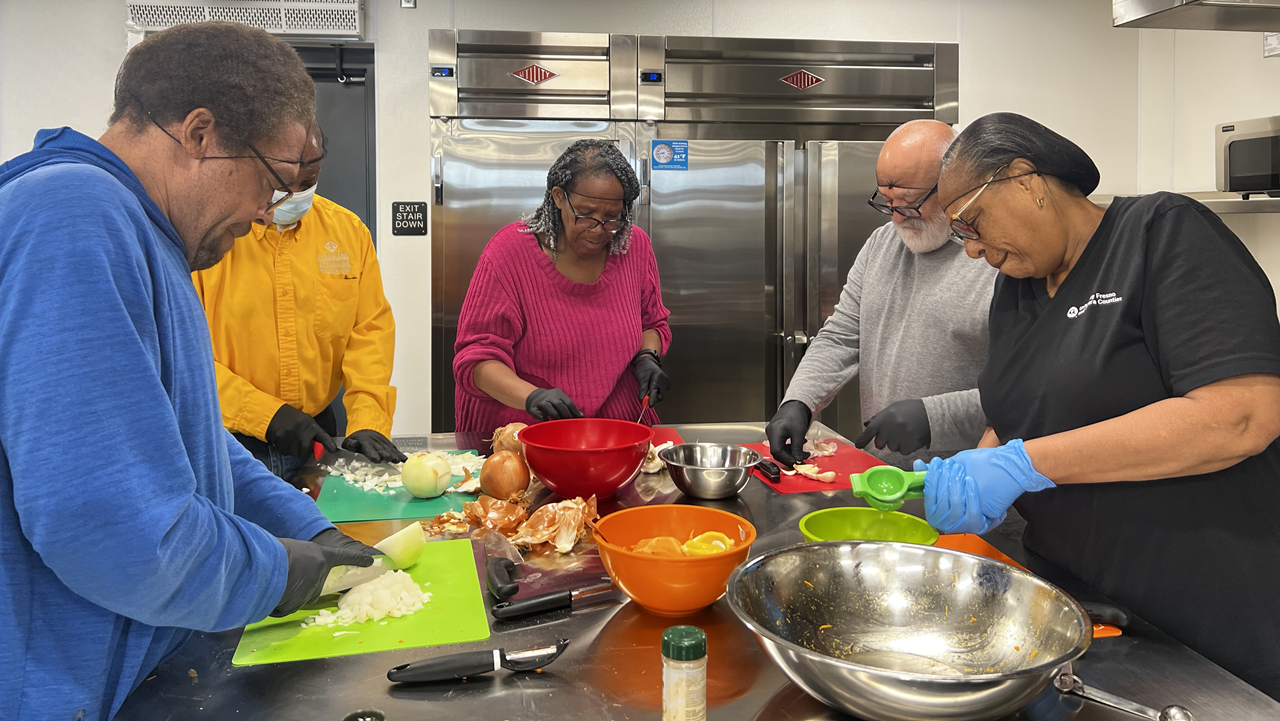 Photo of folks preparing food