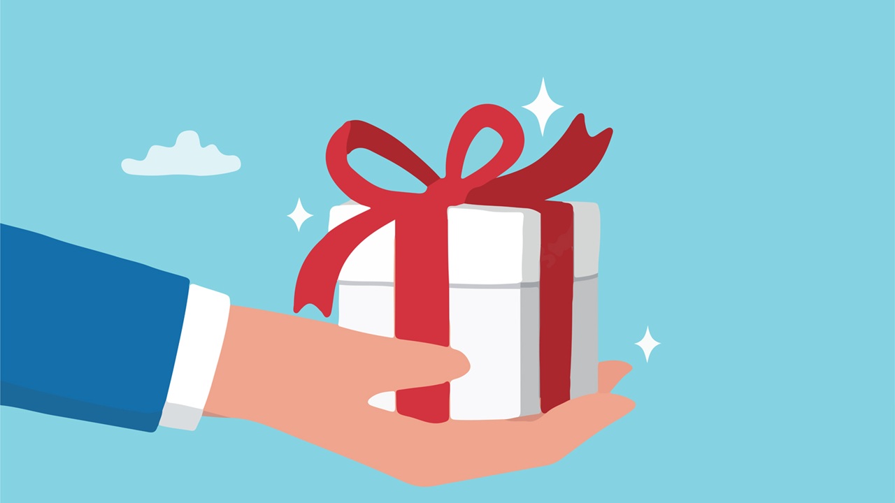 Image of a hand holding a gift