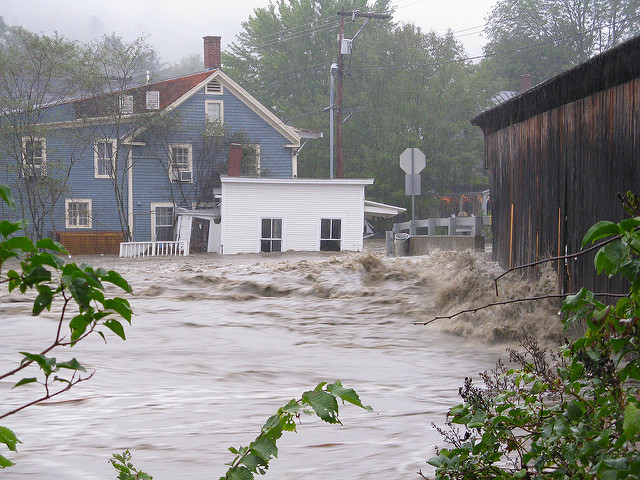 Flooding image of flooded home and barn