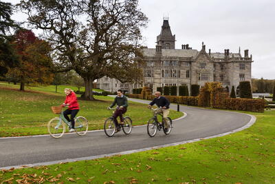 Cycling in front of a Castle in Limerick