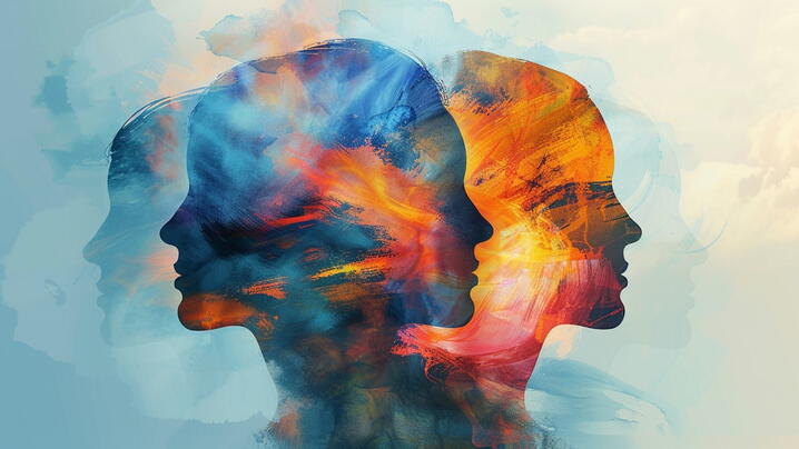 Image of silhouettes against an abstract background