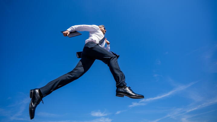 Image of man jumping through the air