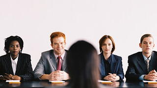 person sitting in interview