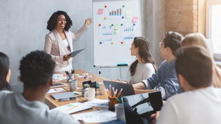 Image of ACAO and others around a conference table