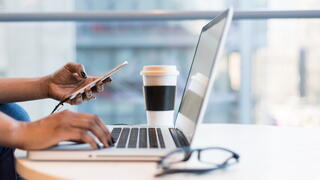 woman of color with laptop