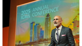 Photo of Arthur Brooks on stage