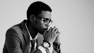 man in suit in deep thought