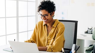 Image of person on laptop