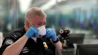 public safety officer wearing mask