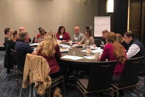 One of the session track groups hard at work discussing the many session ideas submitted by members One of the session track groups hard at work discussing the many session ideas submitted by members